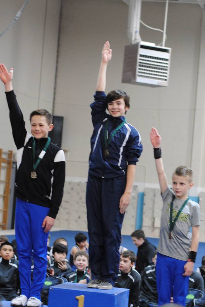 Island boys win big at gymnastics meets