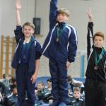 Island boys win big at gymnastics meets
