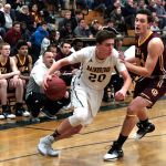 Luciano Marano | Bainbridge Island Review                                Charlie Hoberg drives through O&rsquo;Dea&rsquo;s defenses early on in Friday&rsquo;s home game.
