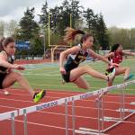 Spartans shine against EC, CHS in fast, furious track meet at home