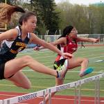 Spartans shine against EC, CHS in fast, furious track meet at home