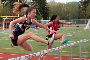Spartans shine against EC, CHS in fast, furious track meet at home
