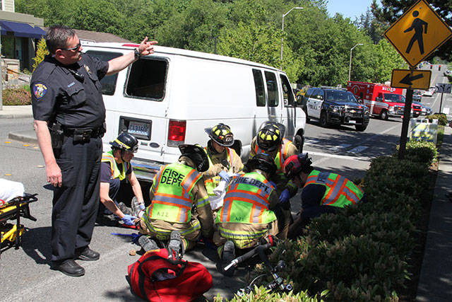 Bicyclist hurt in crash with van on High School Road