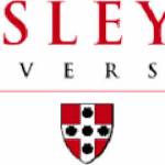 Holmes awarded degree in economics