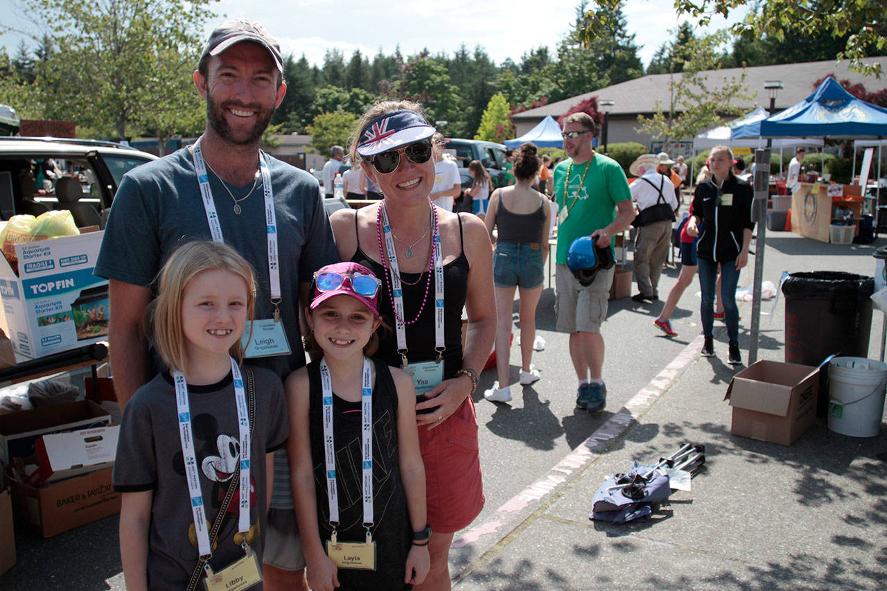 Luciano Marano | Bainbridge Island Review - Yas, Leigh, Layla, 11, and Libby, 9, Grigaliunas, of Brisbane, Australia, came to Bainbridge Island this year to volunteer at and learn about the Rotary Auction and Rummage Sale, now in its 57th year, so as to better organize their own philanthropic garage sale back home, which has quickly grown in scope in just three years.                                 Luciano Marano | Bainbridge Island Review - Yas, Leigh, Layla, 11, and Libby, 9, Grigaliunas, of Brisbane, Australia, came to Bainbridge Island this year to volunteer at and learn about the Rotary Auction and Rummage Sale, now in its 57th year, so as to better organize their own philanthropic garage sale back home, which has quickly grown in scope in just three years.                                 Luciano Marano | Bainbridge Island Review - Yas, Leigh, Layla, 11, and Libby, 9, Grigaliunas, of Brisbane, Australia, came to Bainbridge Island this year to volunteer at and learn about the Rotary Auction and Rummage Sale, now in its 57th year, so as to better organize their own philanthropic garage sale back home, which has quickly grown in scope in just three years.                                 Luciano Marano | Bainbridge Island Review - Yas, Leigh, Layla, 11, and Libby, 9, Grigaliunas, of Brisbane, Australia, came to Bainbridge Island this year to volunteer at and learn about the Rotary Auction and Rummage Sale, now in its 57th year, so as to better organize their own philanthropic garage sale back home, which has quickly grown in scope in just three years.