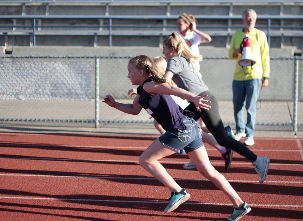 Scenes from the third All-Comers Track Meet | Photo gallery
