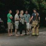 Luciano Marano | Bainbridge Island Review - A Bainbridge Island firefighter diverts pedestrians away from the area of Waterfront Park and the city dock Saturday night during the active shooter stand off, which ended early Sunday after the gunman was shot and killed by police.