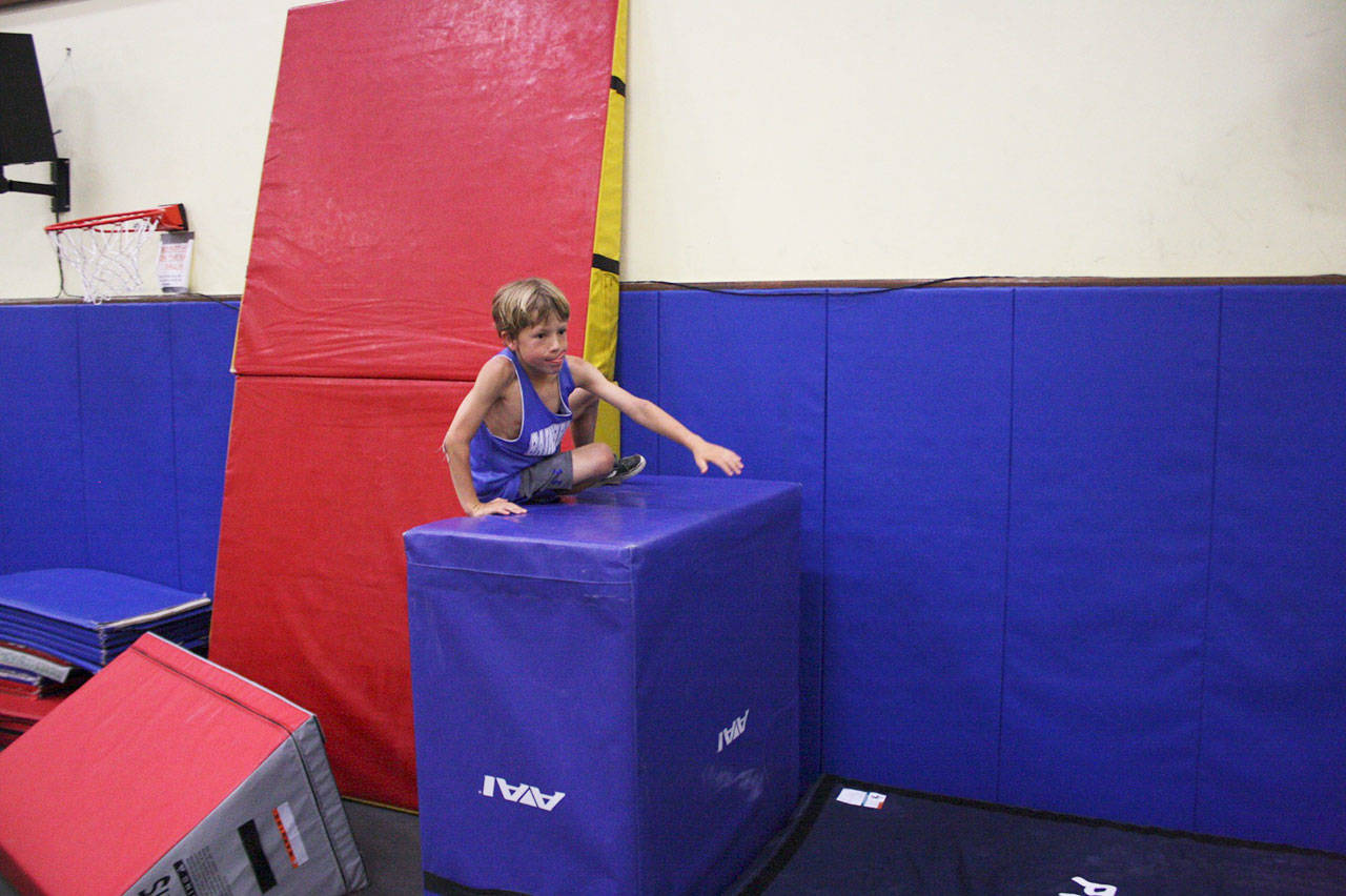 Gravity shmavity: Parkour kids run, jump, tumble off summertime energy