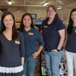 Luciano Marano | Bainbridge Island Review - KC Tan (at left), owner of Bainbridge Island Community Pharmacy, stands with her staff on the new Winslow shop&rsquo;s opening day.