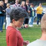 Nick Twietmeyer | The Bainbridge Island Review Debbie Hollyer an organizer with activist group The 4th Branch, speaks at the vigil she helped organize in response to white nationalist demonstrations in Virginia.