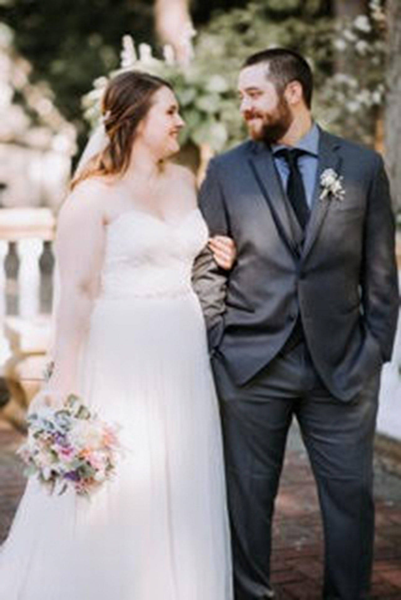 Photo courtesy of Vicky Adkins                                Sarah Elliott and Casey Adkins joined hands in marriage during a July wedding in Bellingham.