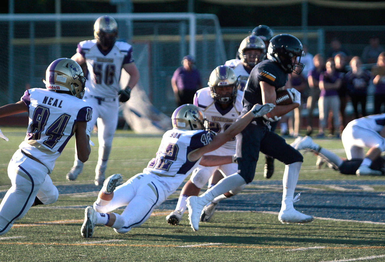 Spartans stumble in first football outing | Photo gallery