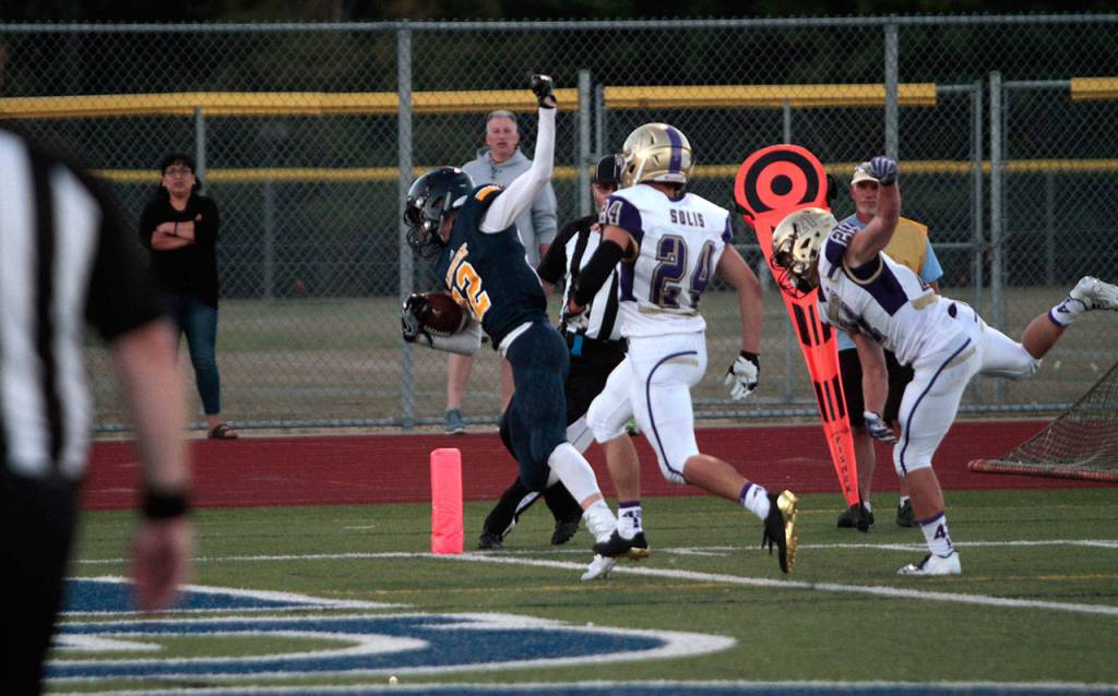 Spartans stumble in first football outing | Photo gallery