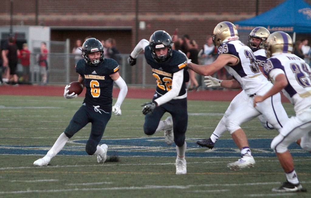 Spartans stumble in first football outing | Photo gallery