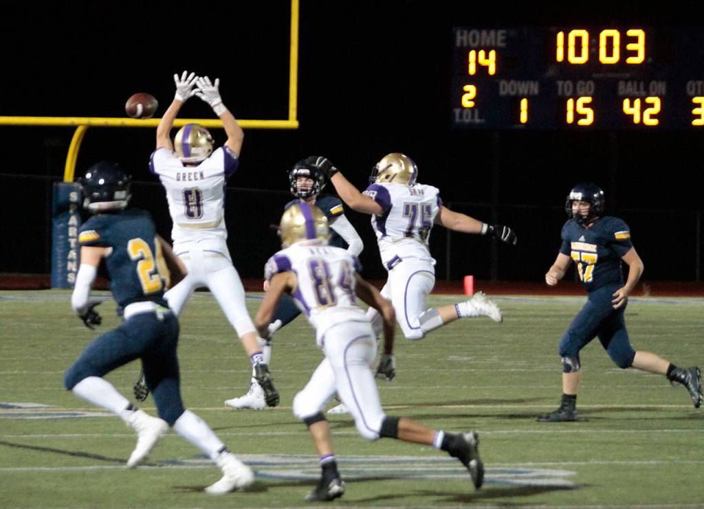 Spartans stumble in first football outing | Photo gallery