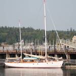 Luciano Marano | Bainbridge Island Review - The Flying Gull, the sailboat from which a gunman fired more than 100 roads from a rifle at the area surrounding Eagle Harbor before being eventually himself shot and killed by police, sits moored at the Washington State Ferries Eagle Harbor Maintenance Facility. The boat is now for sale via an online state auction.