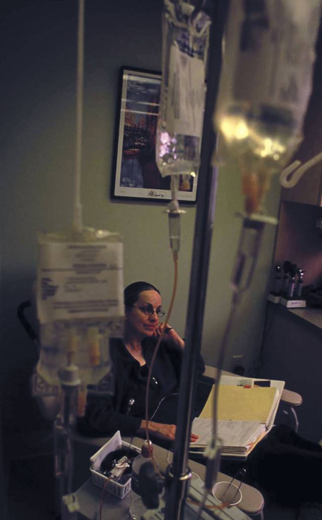 Deep in thought, Nellie Thomas receives chemotherapy for her cancer. Contributed photo.