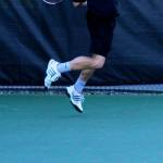 Caleb Camp of Bainbridge Island hits a return during the exhibition match. (Photo courtesy of the Bainbridge Community Tennis Association)