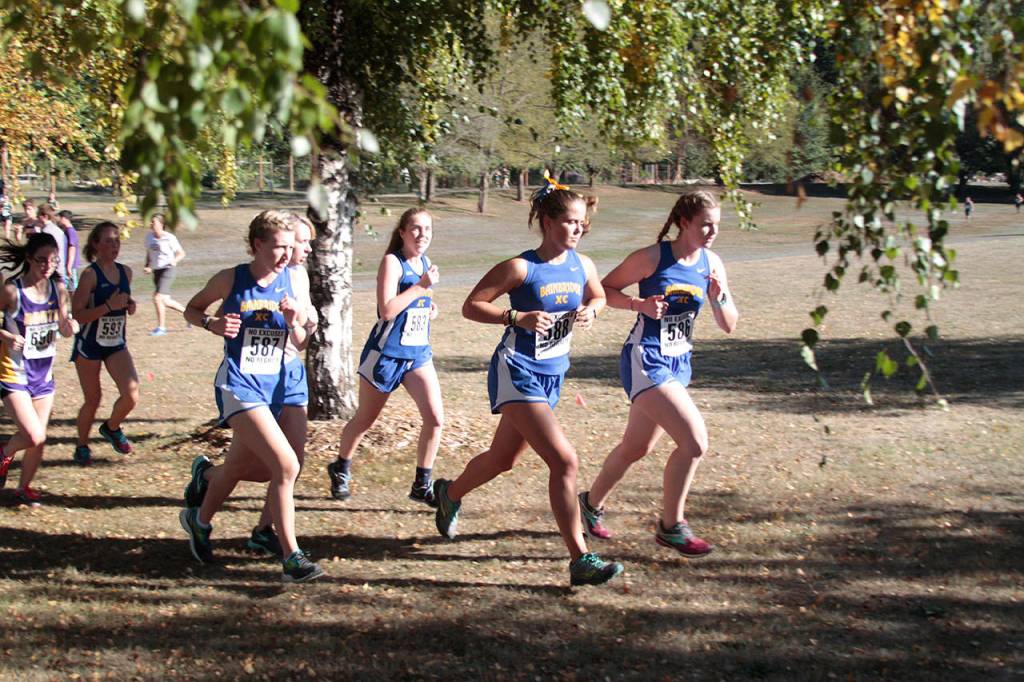 Spartans speed through sole home XC meet to dual first-place finish | Photo gallery