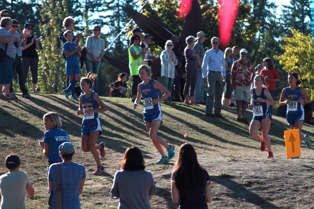 Spartans speed through sole home XC meet to dual first-place finish | Photo gallery
