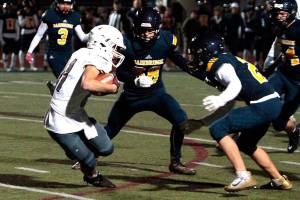 Spartans score a stellar win in year’s football finale | Photo gallery