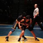 Luciano Marano | Bainbridge Island Review - Bainbridges Rachel Longridge scored a quick win in the 120-pound bracket during the island teams first home match, pinning Garfields Nhu-Phung Tran in 1:03.