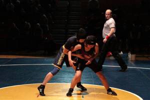 Island grapplers break even in season’s first home match