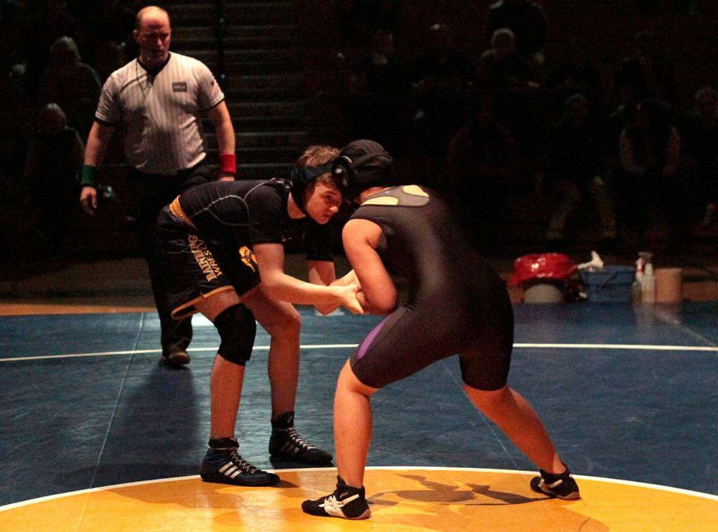 Spartans win some, lose some in year’s first home wrestling meet | Photo gallery