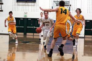 From down under to out in front: Bainbridge boys bested by Aussie hoopsters