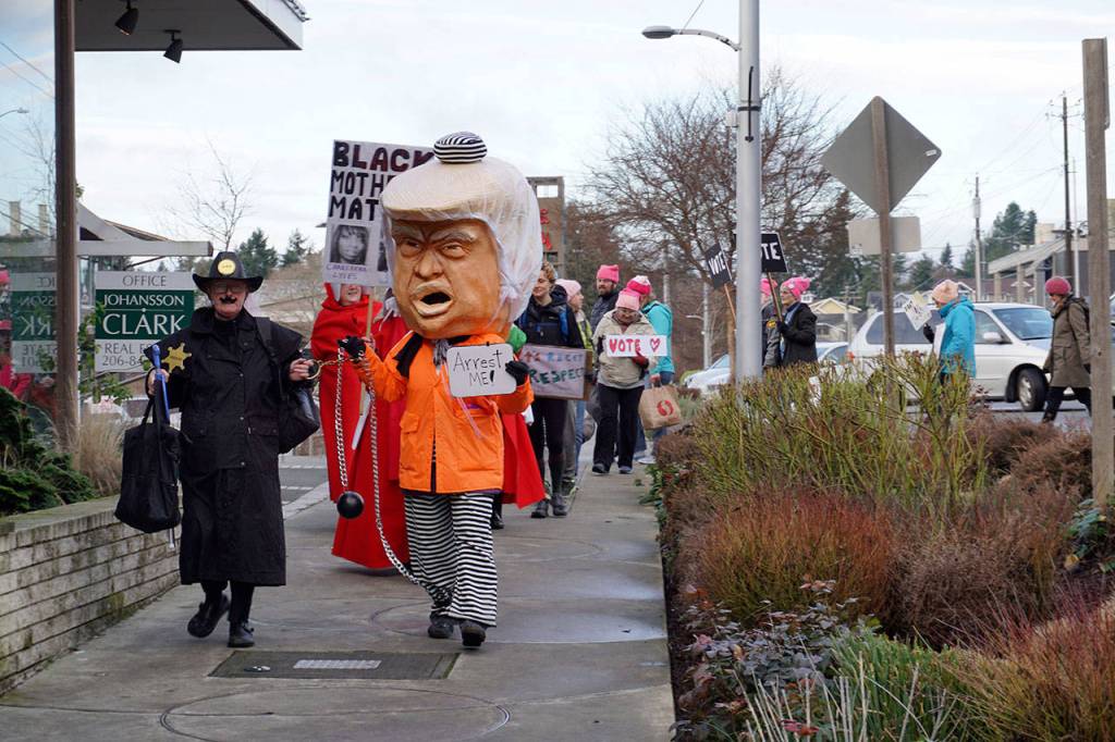 High hopes, busy feet: Bainbridge heads off to the second Women’s March | Photo gallery