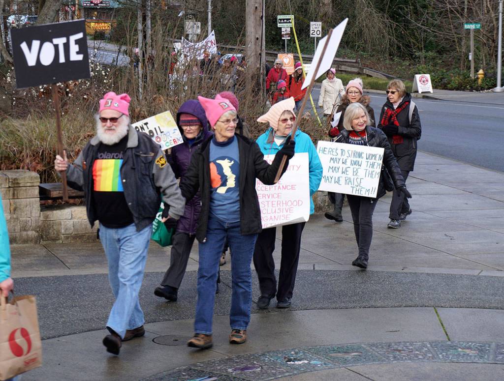 High hopes, busy feet: Bainbridge heads off to the second Women’s March | Photo gallery