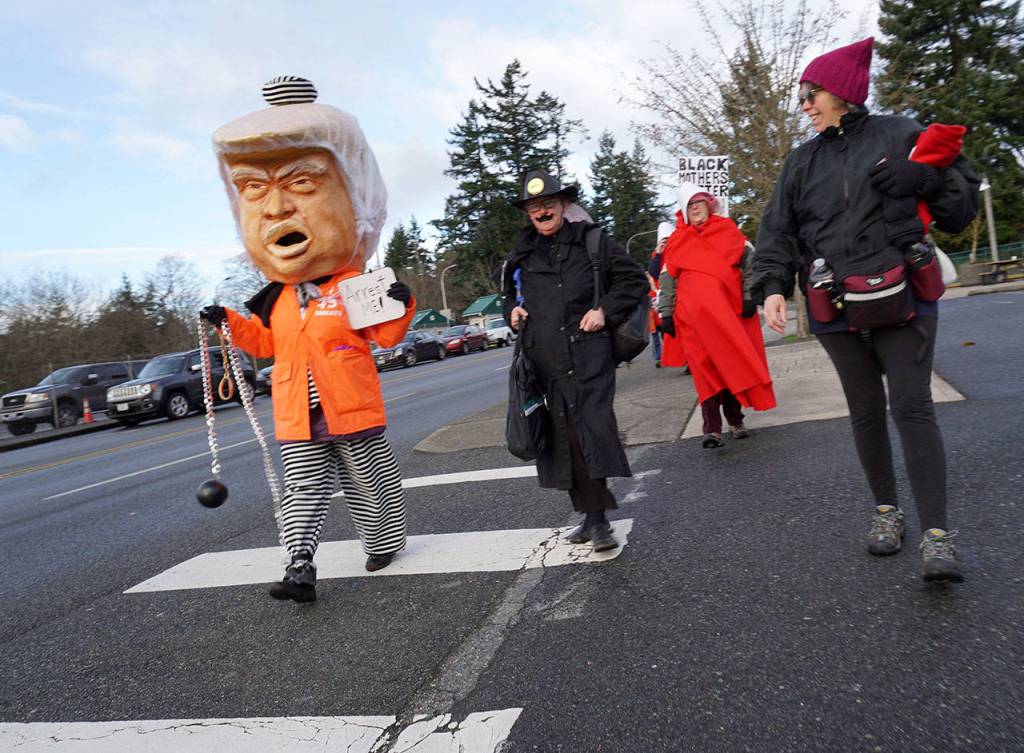 High hopes, busy feet: Bainbridge heads off to the second Women’s March | Photo gallery