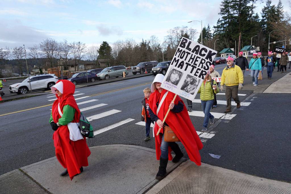High hopes, busy feet: Bainbridge heads off to the second Women’s March | Photo gallery