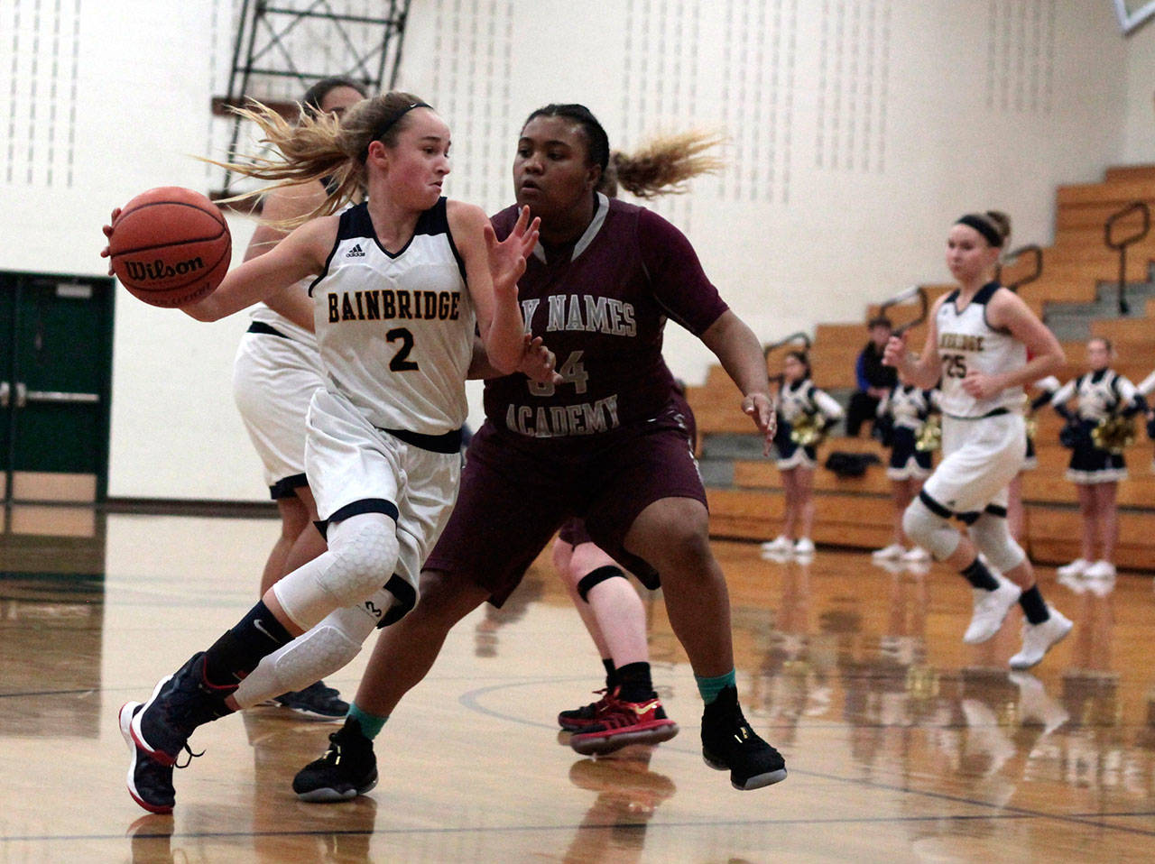 Luciano Marano | Bainbridge Island Review - Spartan sophomore Kendall Havill drives to the hoop during Tuesday nights home game against Holy Names.