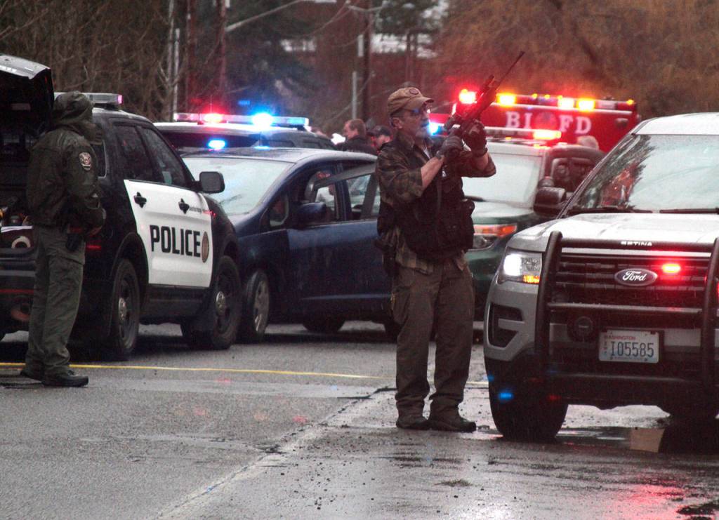 School lockdown leads to frantic manhunt | Photo gallery