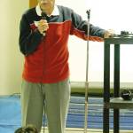 Ed King, the first principal of Wilkes Elementary, talks to students during the last all-school assembly in the old elementary before it closed in 2012. A new Wilkes was rebuilt on the site. (Brian Kelly | Bainbridge Island Review file)