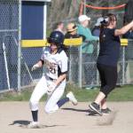 Morgan Lassoff rounds third on her way home for Bainbridges first score of the game against Gig Harbor. (Brian Kelly | Bainbridge Island Review)