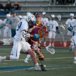 Luciano Marano | Bainbridge Island Review - Spartan senior Jacob Hogger wrestles for the ball during Tuesdays home match against ODea.