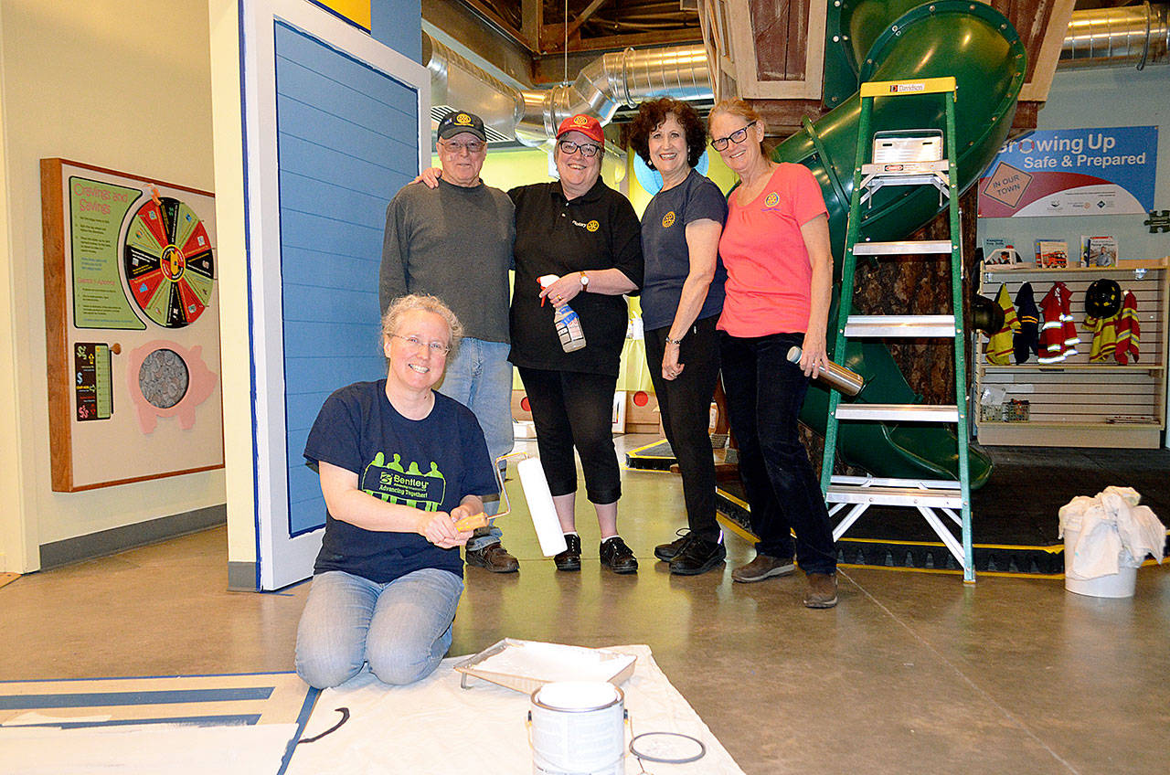 Sarah Albee (in front) is joined by Lee Evans, Susie Burdick, Vicki Evans and Sarah Bryant for Kids Discovery Museums Big Cleanup Day. (Krzysztofa McDonough photo)