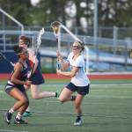 Kendall Havill splits the Nathan Hale defense during the Spartans win Tuesday at home. (Lara Sweeney photo)