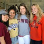 The Spartan senior players on the lacrosse team  Chloe Wilson (Elon University), Gisella Gonzalez (UW), Mackenzie Chapman (playing at Stanford) and Maggie Sweeney (playing at Pomona)  were honored during Senior Night festivities at Bainbridge High Memorial Stadium. (Lara Sweeney photo)