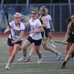 Eleanor King makes her way up the field in the Spartans Senior Night win. (Lara Sweeney photo)