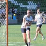 The Spartans Kendall Havill sends in one of her five goals against Ballard. (Brian Kelly | Bainbridge Island Review)