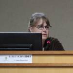 Bainbridge Councilwoman Leslie Schneider tells her fellow council members she will support a revised contract for Police Chief Matthew Hamner. (Brian Kelly | Bainbridge Island Review)