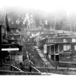 Photo courtesy of the Bainbridge Island Historical Museum | North end of the Washington Hotel (left foreground) and residences, circa 1915.