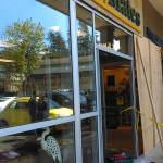 Woman drives her Caddy through island shoe store