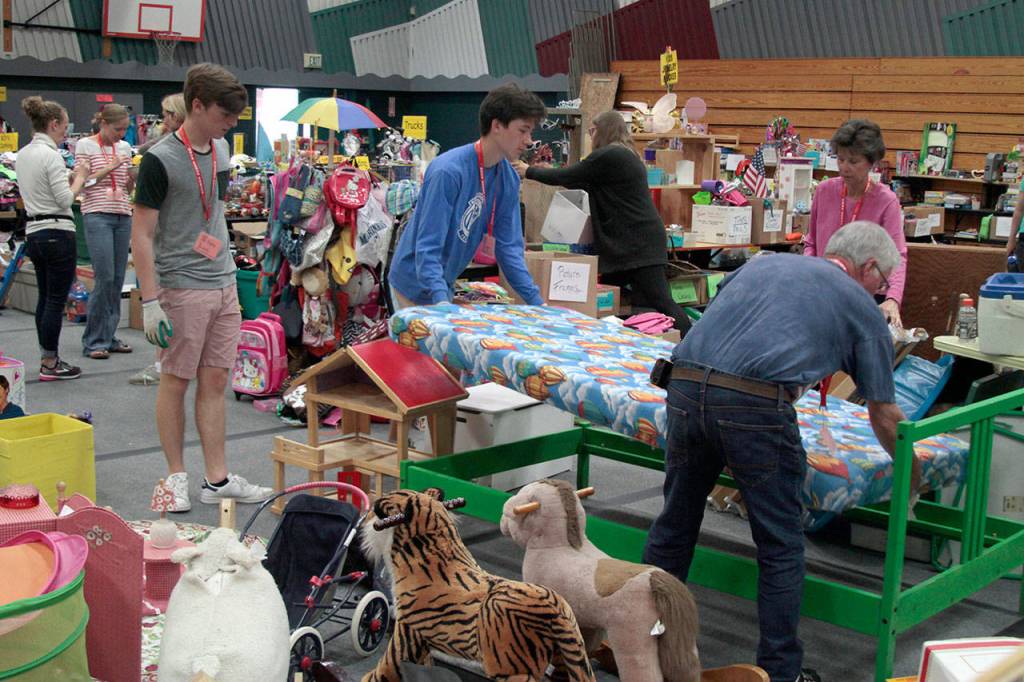 Sneek a peek: Behind the scenes at the Rotary auction | Photo gallery