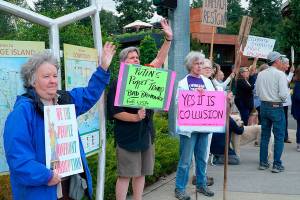 ‘Confront Corruption’ rally occupies Waypoint Park | Photo gallery