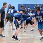On track, indoors: BHS football squad dodges smoke to practice | Photo gallery