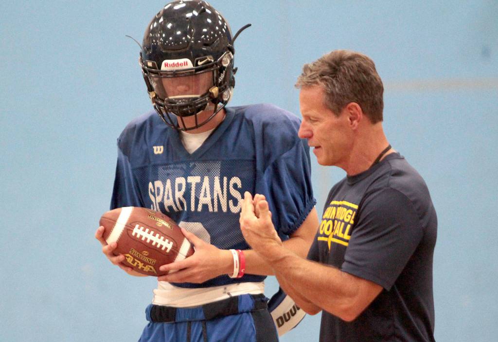 On track, indoors: BHS football squad dodges smoke to practice | Photo gallery